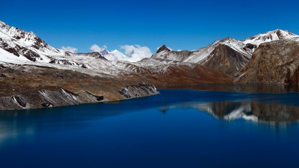 Snowy Mountains Body of Water Wallpaper